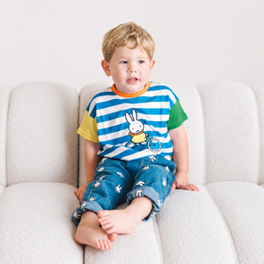Child wearing the Miffy on the Move striped ringer children's T-shirt