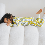 Baby wearing the ZIPSTER x Miffy Hello Yellow bamboo babygrow